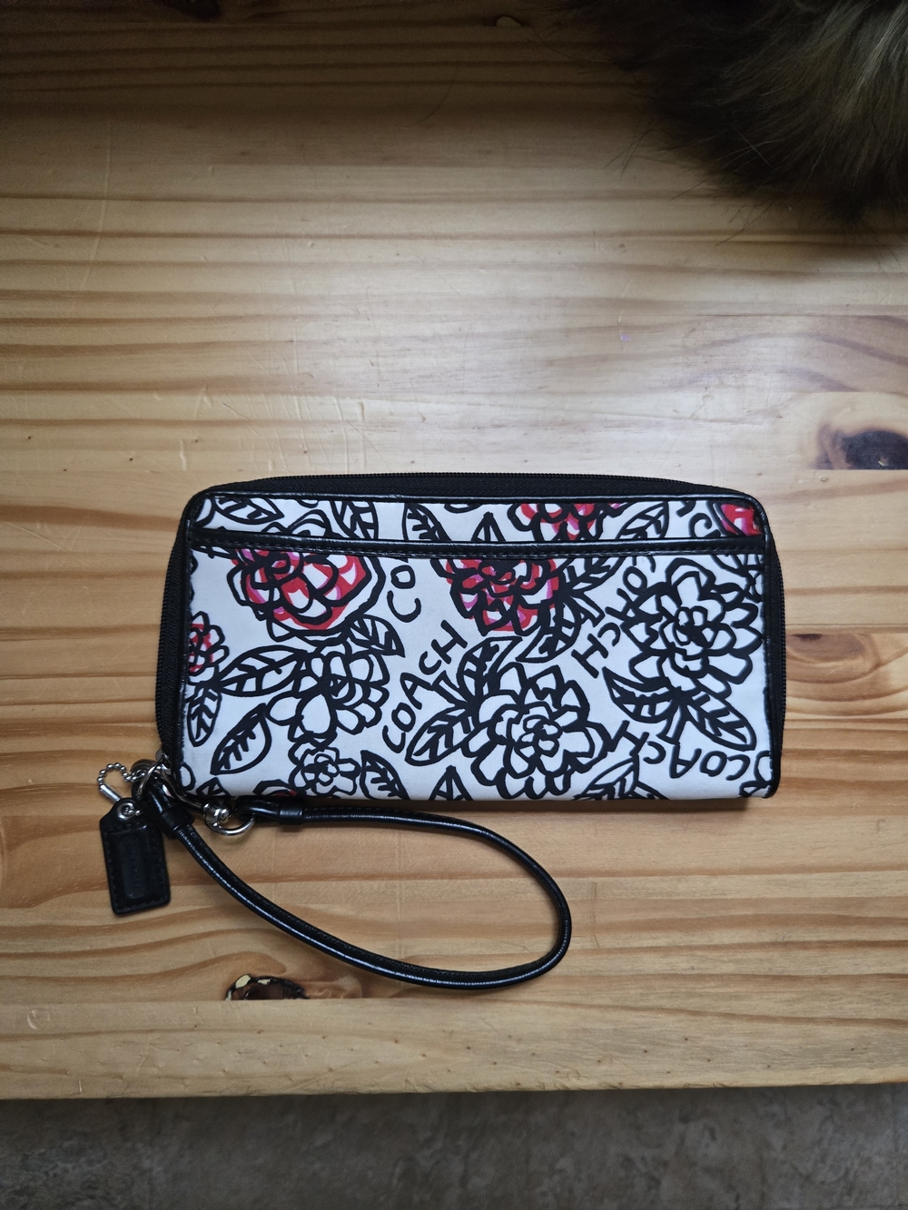 Coach White Floral Zip Wristlet with Black Outline and Red Blooms